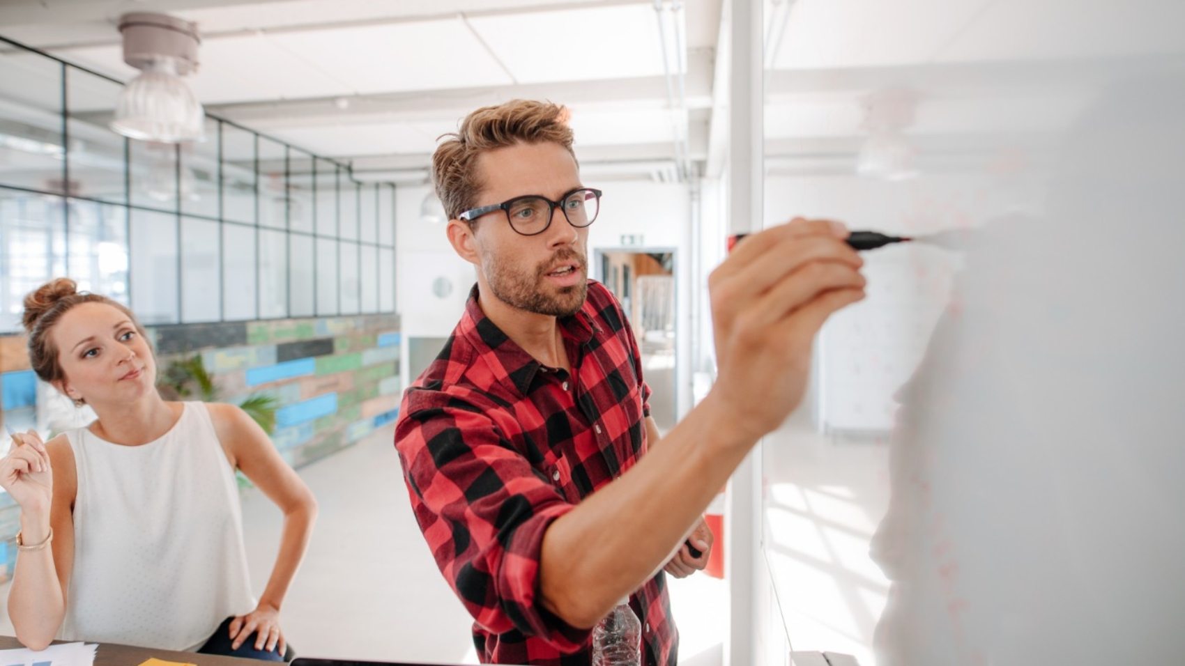 casual-business-giving-a-presentation-to-PJKX6JZ